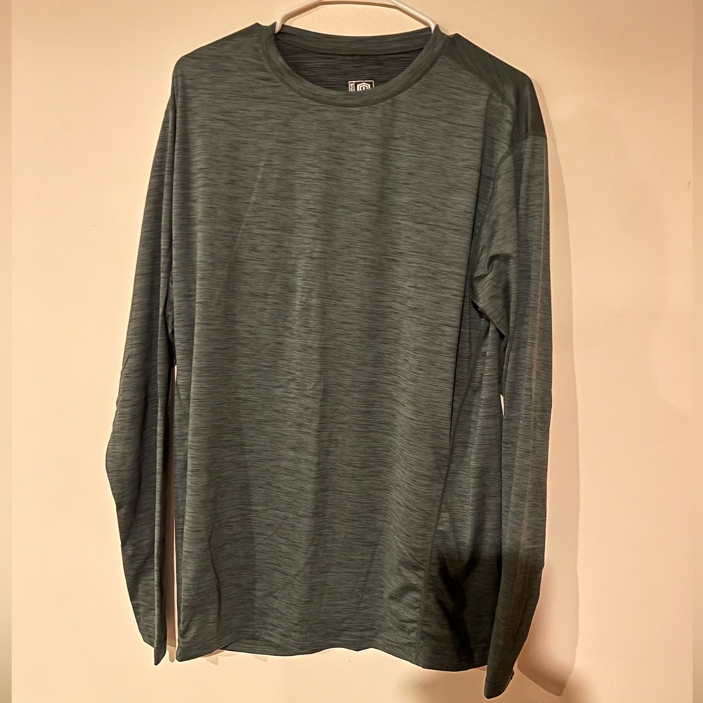 Born primitive large never worn long sleeve green